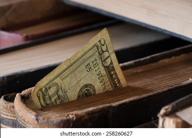 This money on books. Book and money.