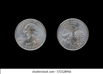 Twenty five American cents (Quarter Dollar) isolated on black background