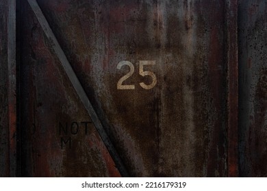 Twenty Five.

A Rough And Corroded Texture Of An Airplane Hanger. 25 Was Painted On The Door Many Years Ago For No One Knows Why.  Its A Dark And Gloomy Building