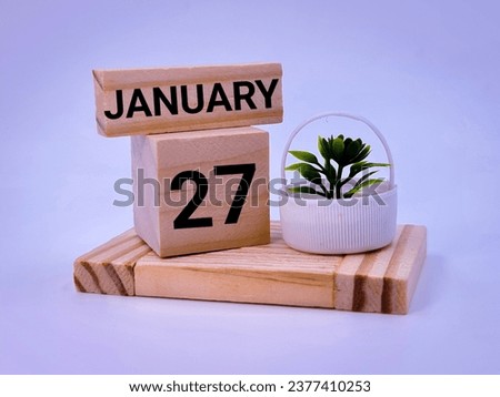 Twenty Seventh January written over wooden blocks 