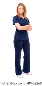 Twenty-something, Blonde, Female Doctor In Dark Blue Scrubs With Arms Crossed  On A White Background