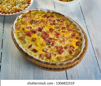 Twice Baked Potato Casserole, Smash The Potatoes With A Potato Masher. Add The Cheese, Seasoned Salt,Cheddar , Sour Cream, Milk, Butter,