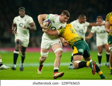 Twickenham, UK. 24th November 2018. England's Mark Wilson Is Tackled By Australia's Pete Samu During The Quilter International Rugby Match Between England And Australia