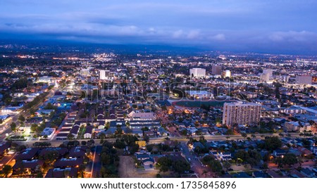 Twilight aerial view of the urban core of downtown Santa Ana, California.