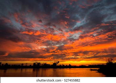 Twilight Beauty Evening Colorful Clouds - Sunlight With Dramatic Sky.Dramatic Sky Reflection In Water.