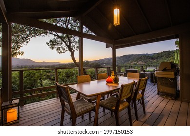 Twilight From The Deck Of A Wine Country Home, Under The Porch Roof, Table Is Set, Ready To Unwind And Watch The Sunset