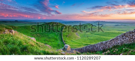 Twilight Panorama at Hadrian's Wall, a World Heritage Site in the beautiful Northumberland National Park. Popular with walkers along the Hadrian's Wall Path and Pennine Way
