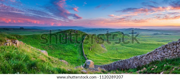Twilight Panorama at\
Hadrian\'s Wall, a World Heritage Site in the beautiful\
Northumberland National Park. Popular with walkers along the\
Hadrian\'s Wall Path and Pennine\
Way