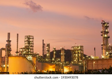 Twilight scene of tank oil refinery plant and tower column of Petrochemistry industry in site construction