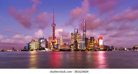 Twilight shot with the Shanghai skyline and the Huangpu river, China - Powered by Shutterstock