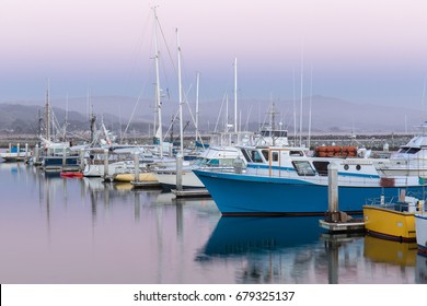 Twilight Skies on fishing boats moored at Pillar Point. Half Moon Bay, San Mateo County, California, USA.