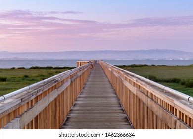 Twilight skies over the new boardwalk at Palo Alto Baylands. Palo Alto, Santa Clara County, California, USA.