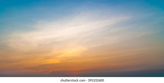 twilight sky with colorful sunset and clouds - Shutterstock ID 395332600