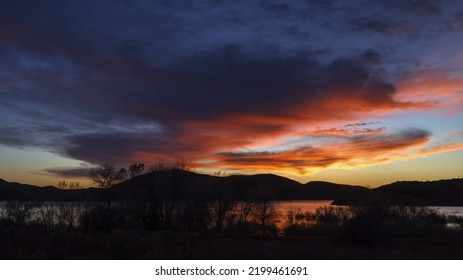 Twilight sky over Bouquet Reservoir in Los Angeles County, Southern California, United States. - Shutterstock ID 2199461691