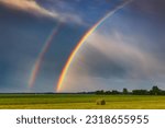 Twilight Splendor: The Mesmerizing Double Rainbow Landscape