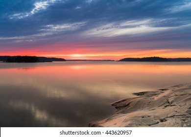 Twilight Sunset View Of The Scandinavian Baltic Sea And Swedish Archipelago With Rocks In The Sea. Shot During Mid Summer Festival