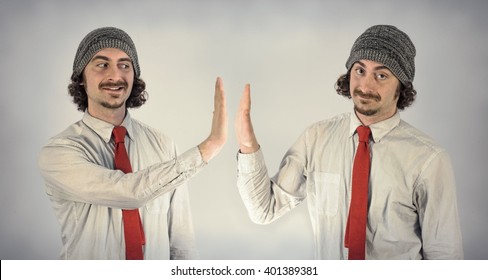 Twin Adult Men With Beards High Five Eachother