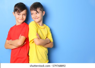 Twin Brothers On Blue Background