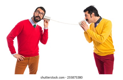 Twin Brothers Talking Through A Tin Phone 