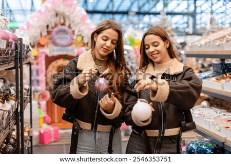 Image, Stock Photo Twins dressed in Christmas outfits in a festive kitchen