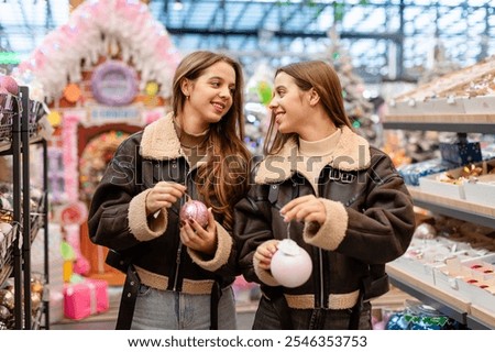 Similar – Image, Stock Photo Twins dressed in Christmas outfits in a festive kitchen