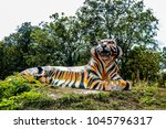 Twin tiger statue in the park on selective focus