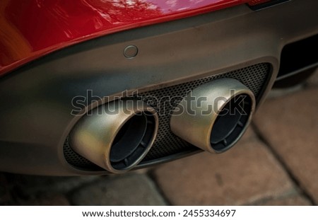 Twin tip exhaust pipes on a car