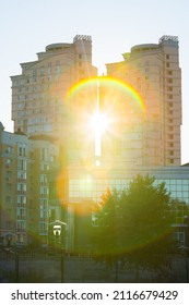 twin towers against sunset. two residential buildings. similar high-rise apartment buildings. modern urban housing complex. sun rays shining into the lens. lens flare
October 16, 2019 Kyiv, Ukraine