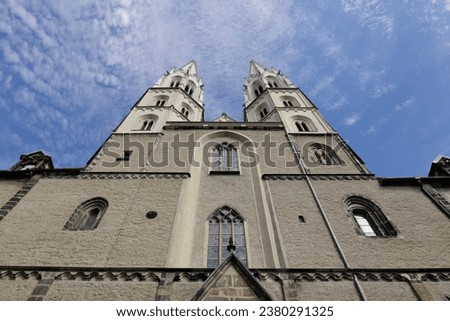 The twin towers of the Peterskirche in Görlitz rise towards the sky