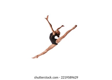 Twine in jump. Emotions in motion. Portrait of junior gymnast in black sport swimsuit doing gymnastics excercises isolated over white background. Sport, skills, achievements - Powered by Shutterstock