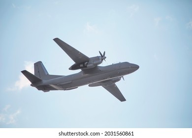 A twin-engine military transport aircraft performs a flight.