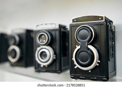 Twin-lens reflex camera. Group of Old Retro Analog Photo Cameras. Shallow Depth of Field - Powered by Shutterstock