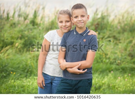 twins-boy-girl-9-years-450w-1016420635.j