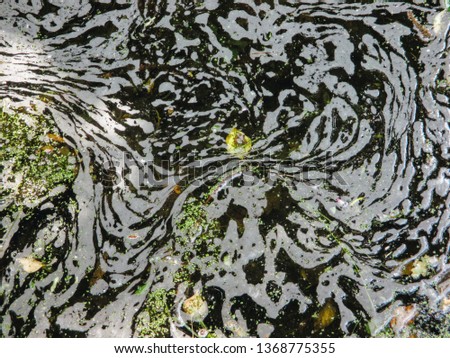twirly pattern in water