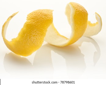 Twist Of Citrus Lemon Peel On A White Background.