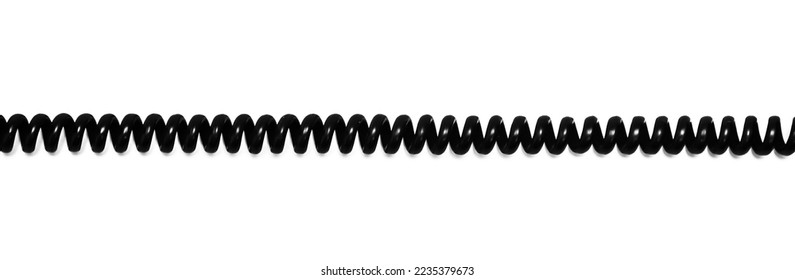 Twisted black telephone cord on a white background.Black telephone wire. - Shutterstock ID 2235379673