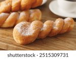 Twisted bread donuts with sugar