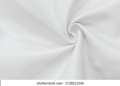 Twisted White Faux Leather. Artificial Fabric Texture Close-up, Useful As A Background.