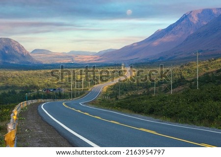 Twisting road running beside the Tablelands in the Gros Morne National Park in Newfoundland, Canada Imagine de stoc © 