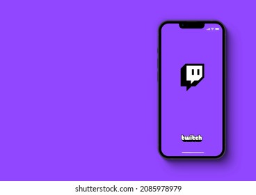Twitch app on smartphone iPhone 13 Pro screen on purple background. Rio de Janeiro, RJ, Brazil. November 2021.
