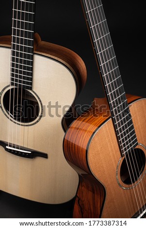 Two Acoustic Guitar Bodies on Black Background 6 String Jazz Blues Folk