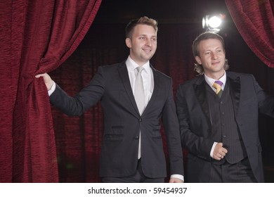 Two Actors In Spotlight On The Stage