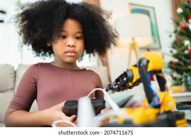 Two African American Girls Learned Robot Arms With A Program Computer. Innovative Technology Mechanical For Assistive Technology