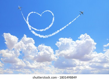 Two Aircrafts Draw A Heart In The Sky. Flight Route Of Aircraft In Shape Of A Heart. Love Concept For Traveling The World