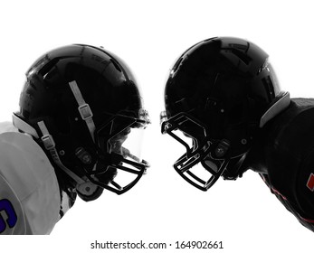 two american football players face to face in silhouette shadow on white background