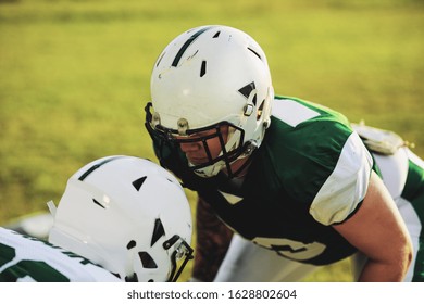 Two American Football Players Lining Up To Do Defence And Tackling Drills During A Team Practice