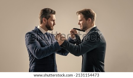 two angry businessmen fighting and arguing on businessmeeting have business competition, leadership.