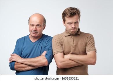 Two Angry Men Father And Son Having Angry Grumpy Feeling. Family Quarrel.