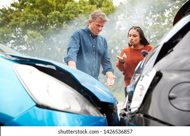 Two Angry Motorists Arguing Over Responsibility For Car Accident - Shutterstock ID 1426536857