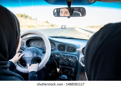 Two Arabic Women Driving While Arguing